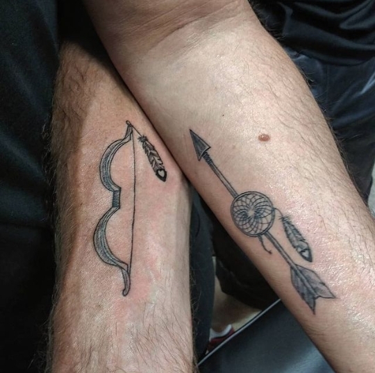 Bow and arrow tattoo