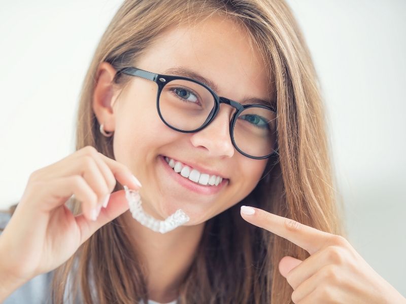 woman happy with her invisalign