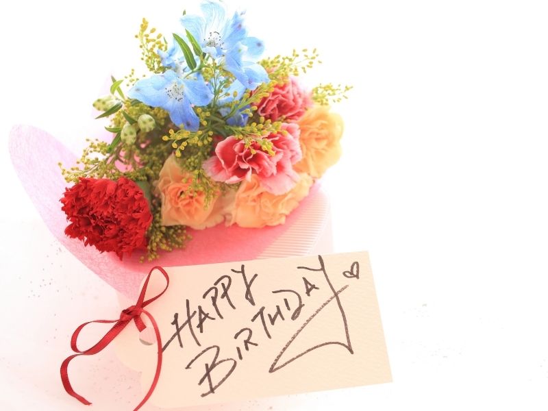 flower bouquet with happy birthday note